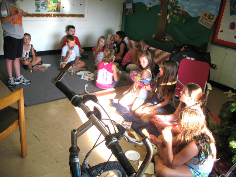 vacation bible schoolers enjoying a snack.